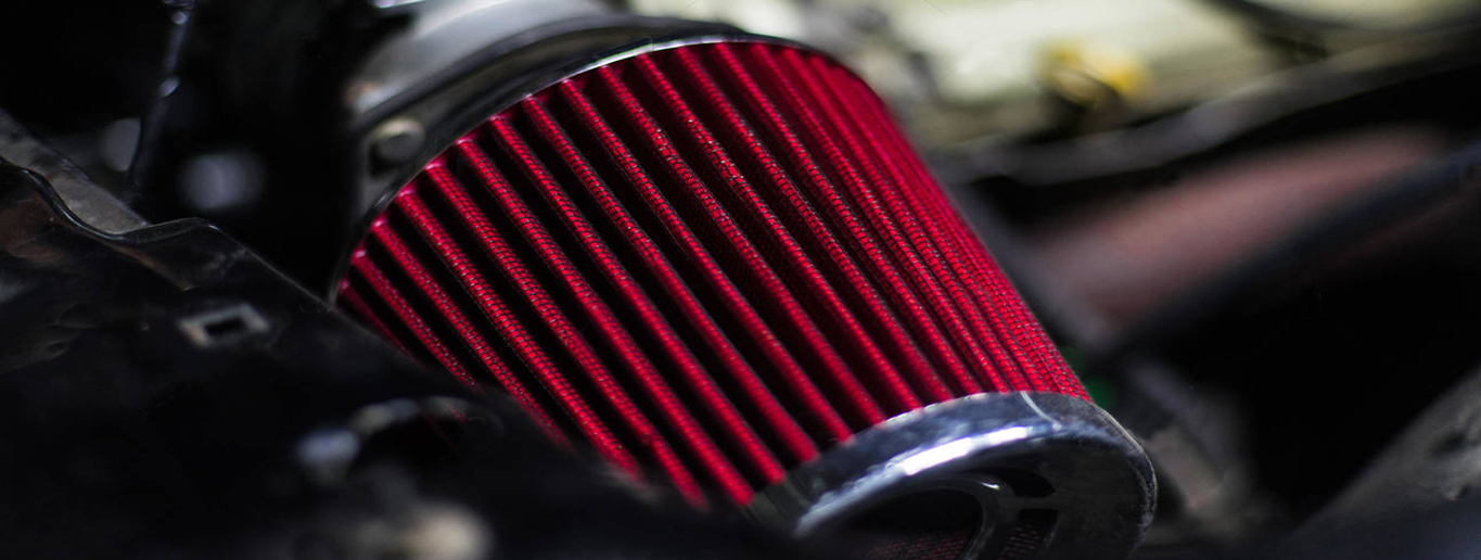 high-performance-red-air-filter-of-sport-car-with-engine-on-back-r2gpfg45BFD424-6F0E-312B-0B31-C72B7D9E6360.jpg